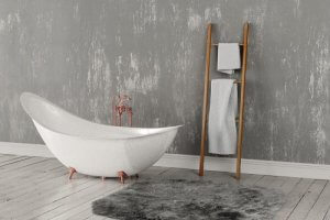 Een houten ladder als handdoekhouder