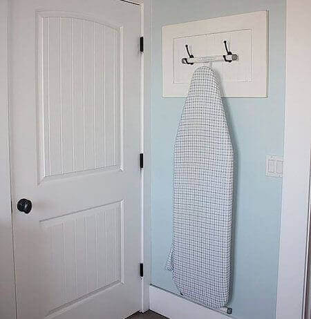 Hoe een strijkplank op te bergen